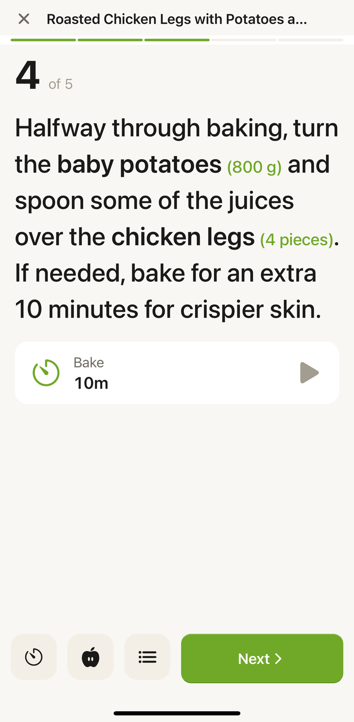 une étape du mode cuisine affichant « Cuire 25 minutes » avec un bouton de minuteur prêt à être touché